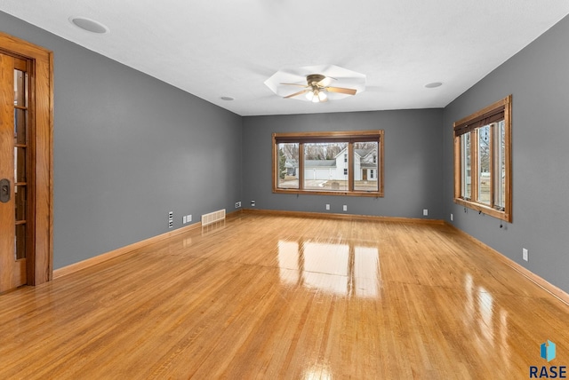 interior space featuring ceiling fan and light wood-type flooring