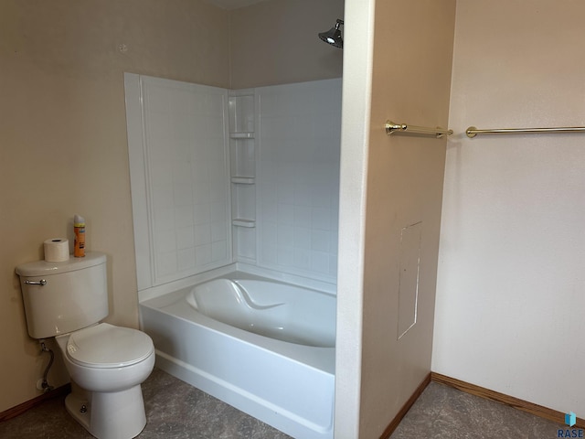 bathroom featuring toilet and bathtub / shower combination