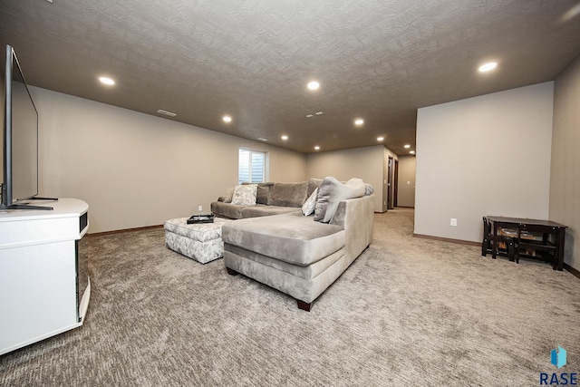 living room with light carpet and a textured ceiling