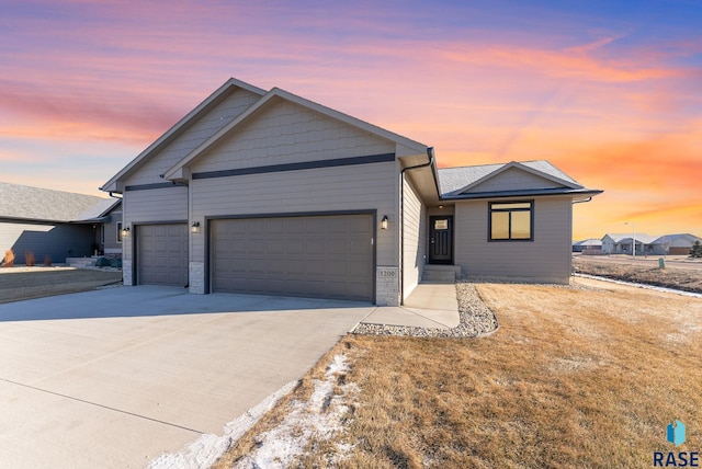 view of front of property with a garage