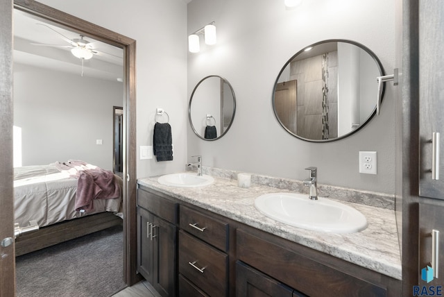 bathroom featuring ceiling fan and vanity