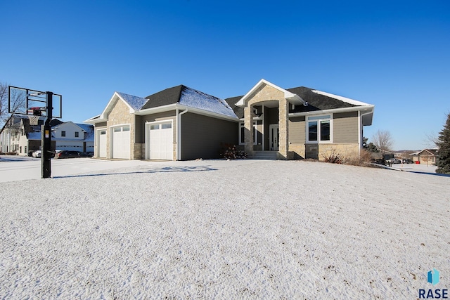 ranch-style home featuring a garage