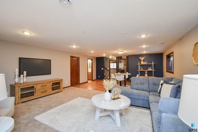 living room with light colored carpet