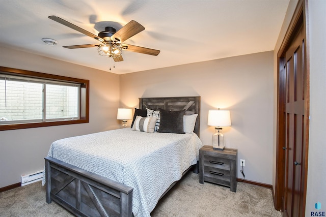 bedroom with ceiling fan, a baseboard radiator, and light carpet