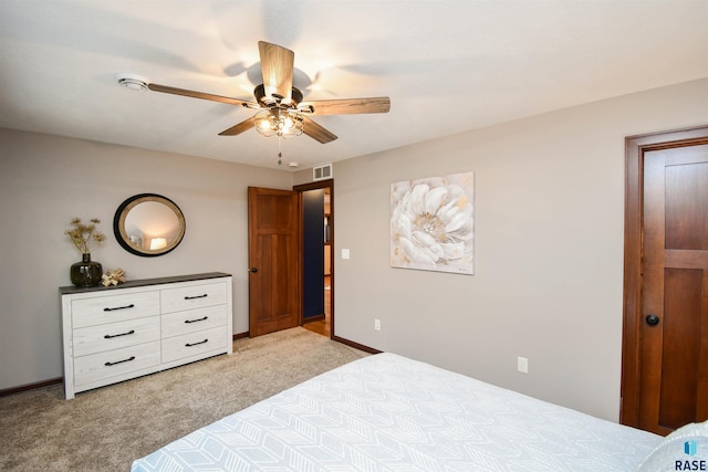 bedroom featuring ceiling fan and light colored carpet