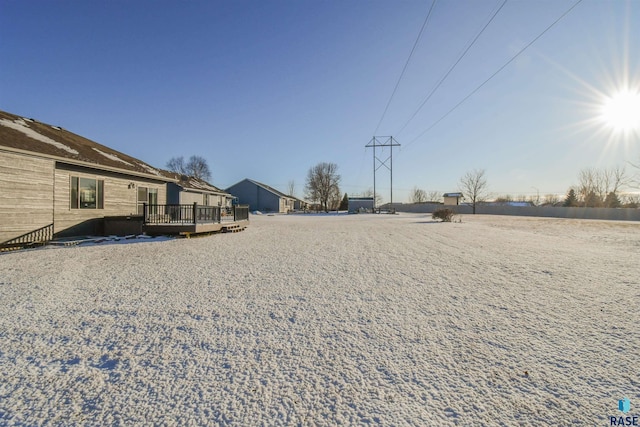 view of yard featuring a wooden deck