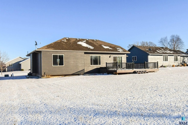 rear view of house with a deck