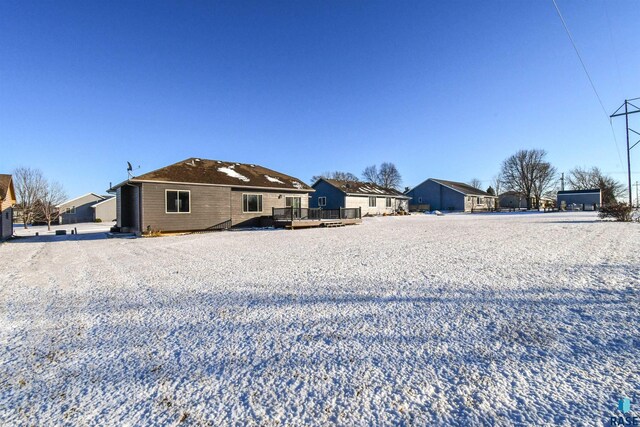 rear view of property with a deck