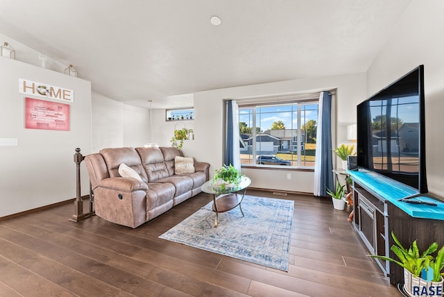 living room with dark hardwood / wood-style floors