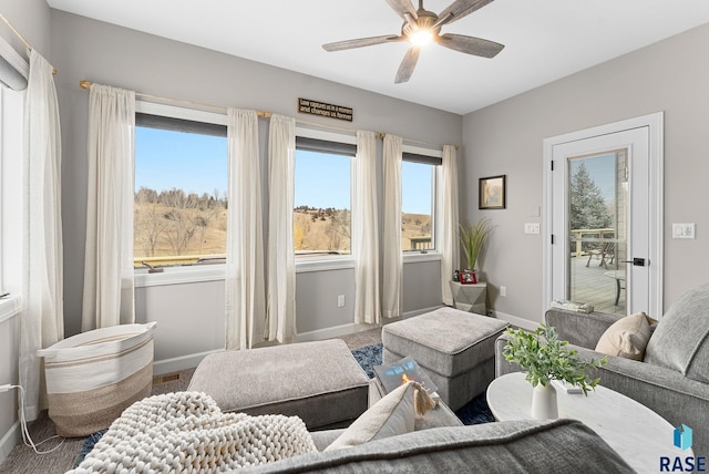 living room with ceiling fan