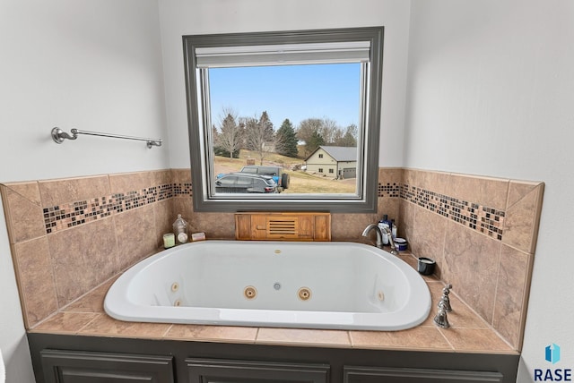 bathroom with a tub