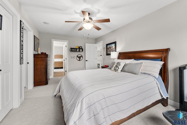 carpeted bedroom featuring ceiling fan