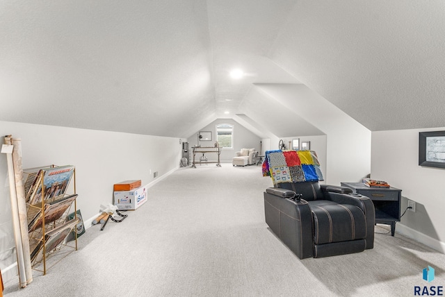 interior space with carpet floors and lofted ceiling