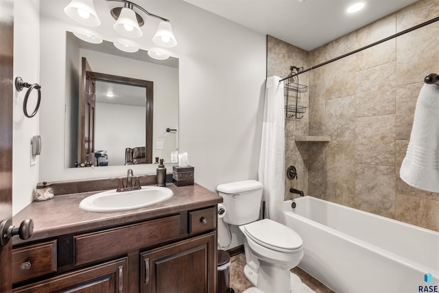 full bathroom with toilet, vanity, and shower / bath combination with curtain