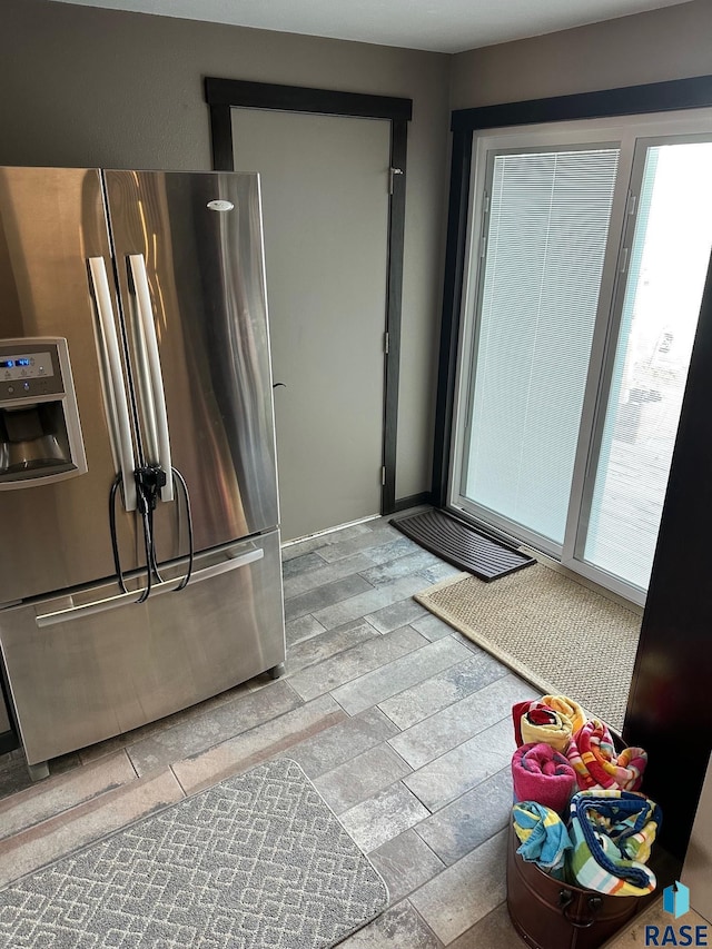 kitchen featuring stainless steel fridge