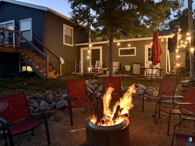 view of patio with an outdoor fire pit