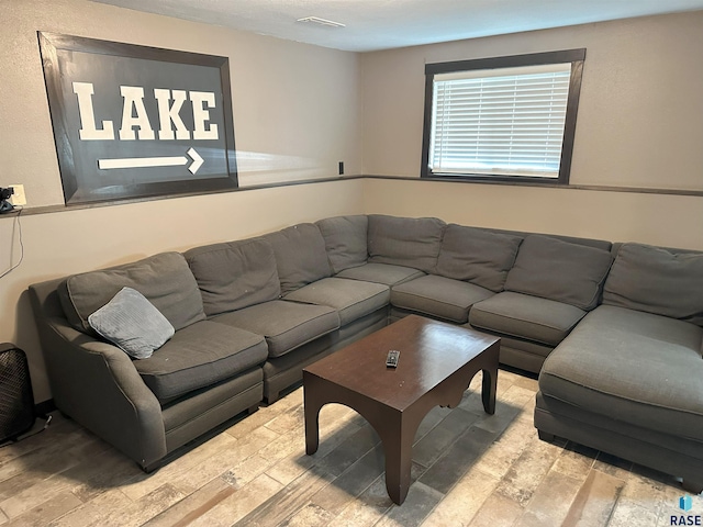 living room with light hardwood / wood-style floors