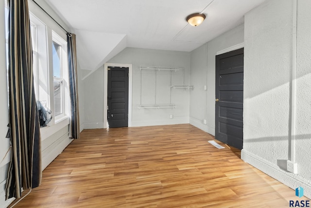 bonus room featuring light hardwood / wood-style floors