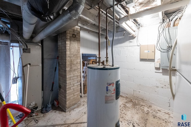 utility room with water heater