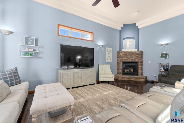 living room with wood-type flooring, a fireplace, and ceiling fan