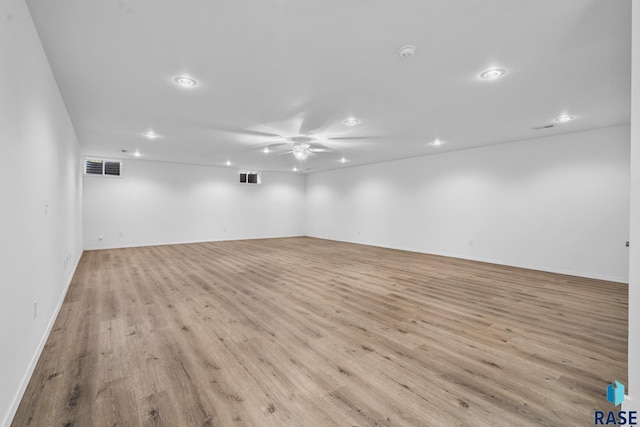 spare room featuring light wood-type flooring