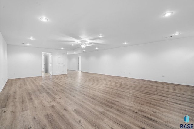 interior space featuring ceiling fan and light hardwood / wood-style floors