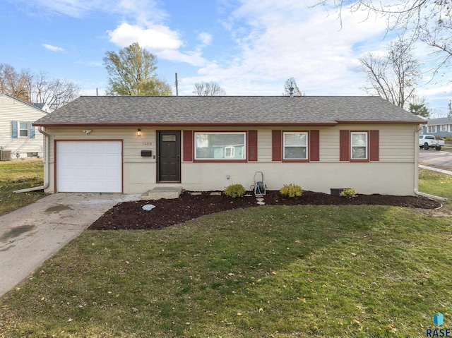 ranch-style home with a front lawn and a garage