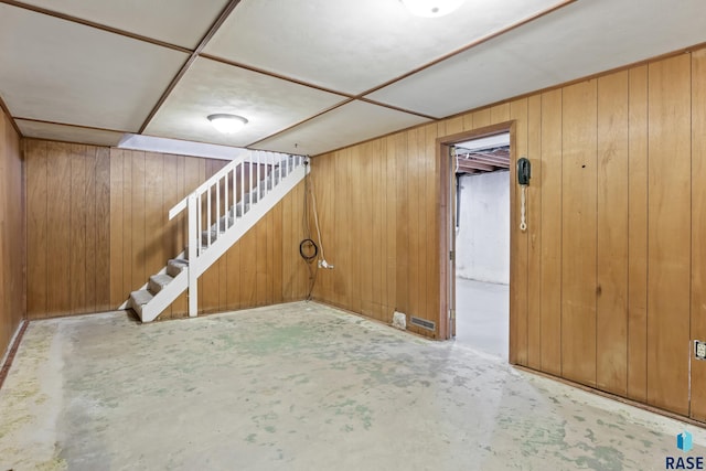 basement with wood walls