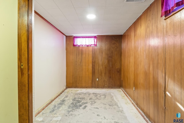 basement with wood walls