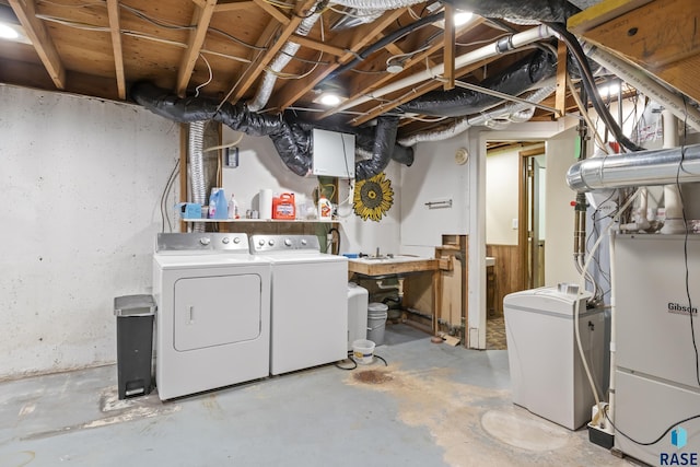 basement with washer and clothes dryer