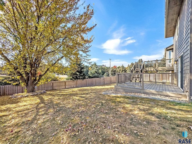 view of yard featuring a deck