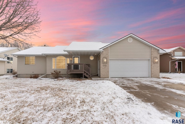 single story home with a garage