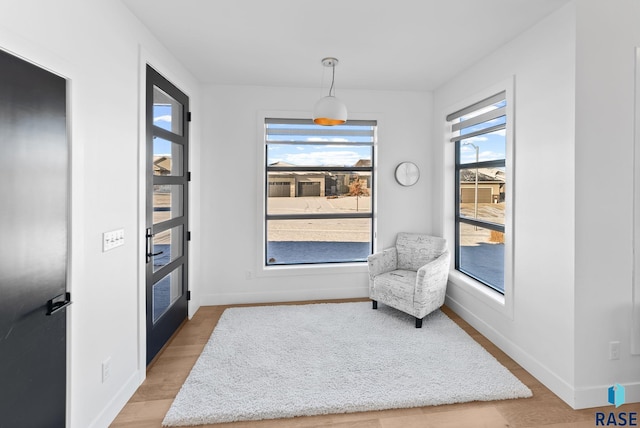 living area with wood-type flooring