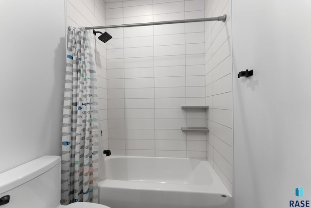 bathroom featuring toilet and shower / bathtub combination with curtain