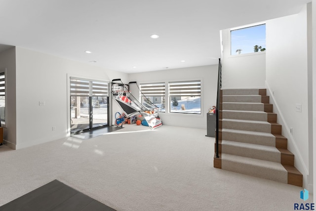 playroom featuring a wealth of natural light and carpet