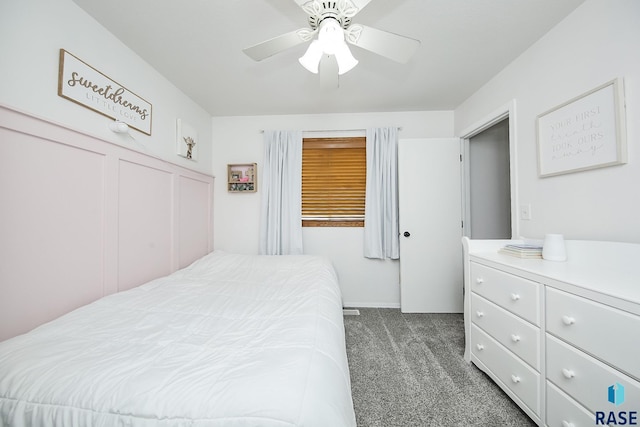 carpeted bedroom featuring ceiling fan