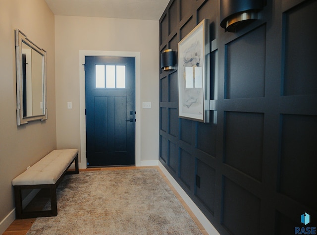 entryway with light hardwood / wood-style flooring