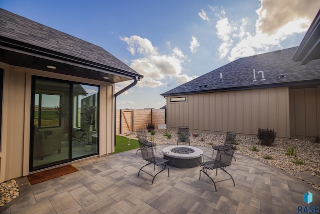 view of patio / terrace with an outdoor fire pit