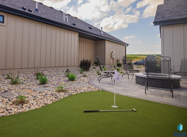 exterior space featuring a fire pit