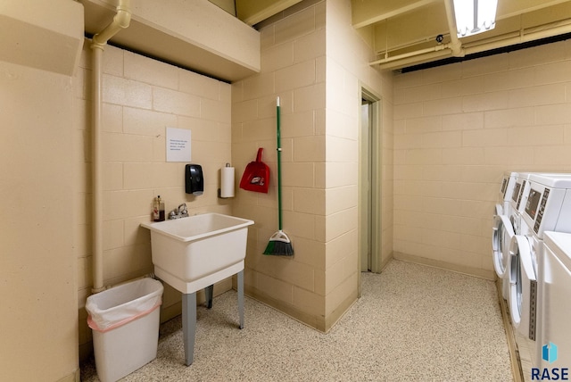 bathroom featuring separate washer and dryer