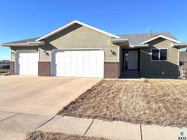 ranch-style home featuring a garage