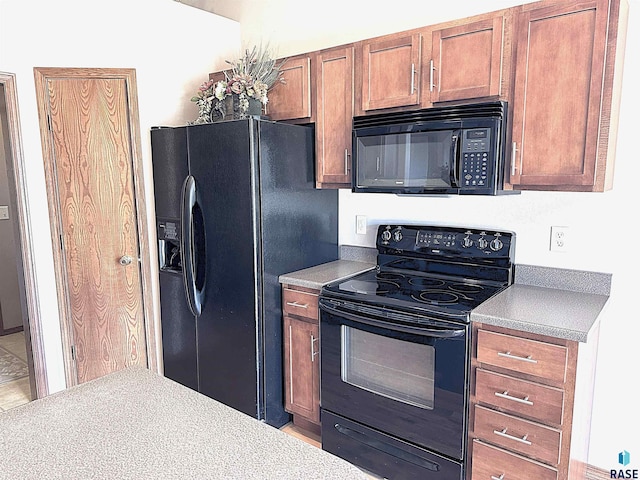 kitchen with black appliances