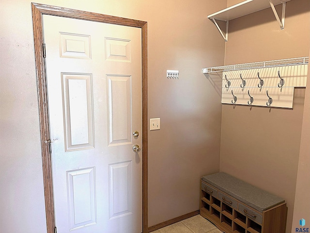 mudroom with light tile patterned flooring