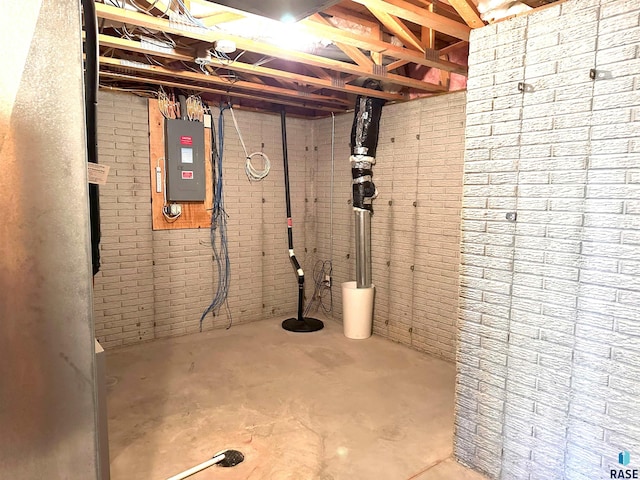 basement featuring electric panel