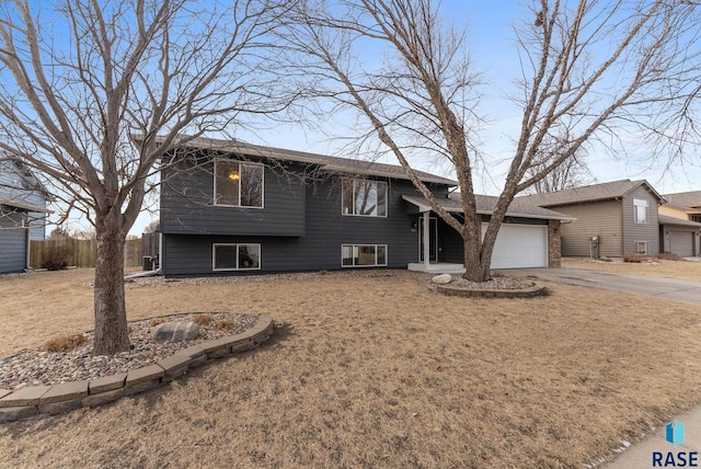 split level home featuring a garage