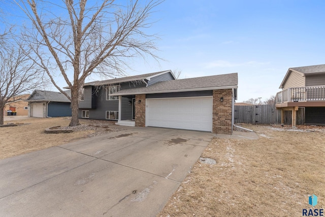 split level home with a garage