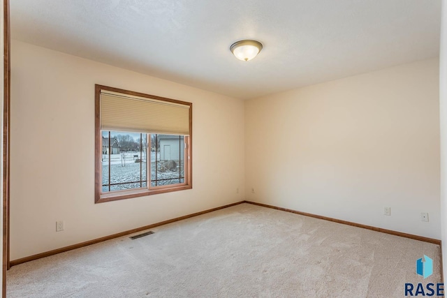 view of carpeted spare room