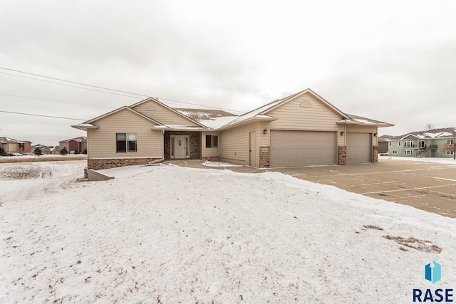 single story home with a garage