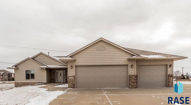 single story home featuring a garage