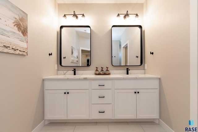 bathroom featuring tile patterned floors and vanity